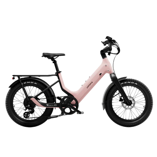 Urtopia Carbon Joy Ultra eBike in Lychee Pink, side view, showcasing sleek carbon frame and modern design