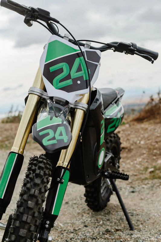 A black eMOTO eBike Drift Hero 1600w dirt bike with rugged tires, sturdy frame, and front suspension, displayed on a white background.