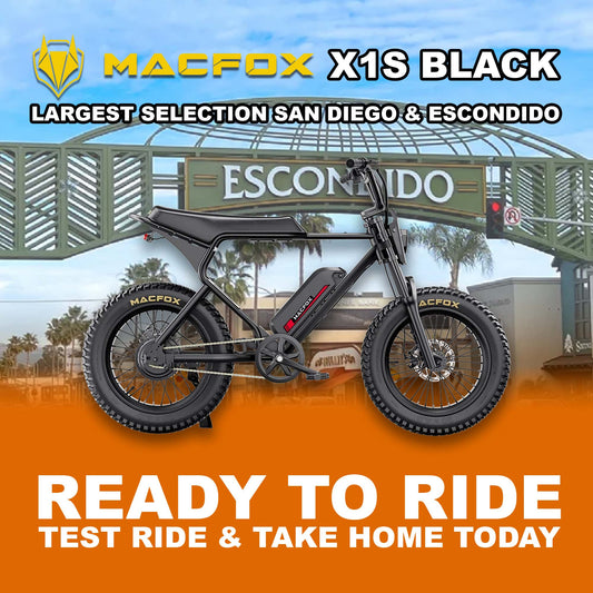 Black Macfox X1S electric bike side view, showcasing sleek frame design and rugged tires