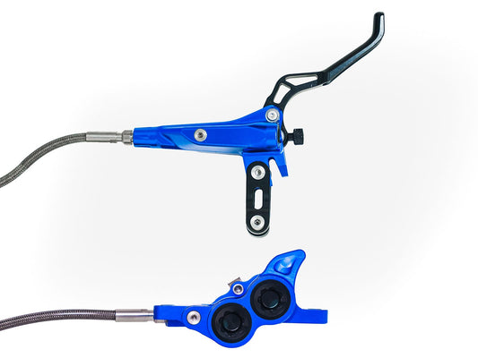Blue Stomp Ebox Megalith Performance Brake Kit, including brake calipers, rotors, and hardware, displayed on a white background