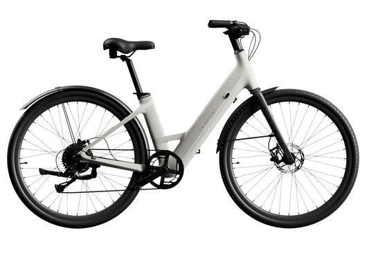 Urtopia Carbon 1 Step Thru eBike in creme color, side view, showcasing lightweight carbon frame and step-through design