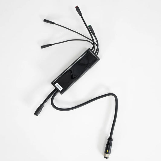 Front view of the Super73 Z Miami Series eBike controller showing wiring harness and connectors against a white background.