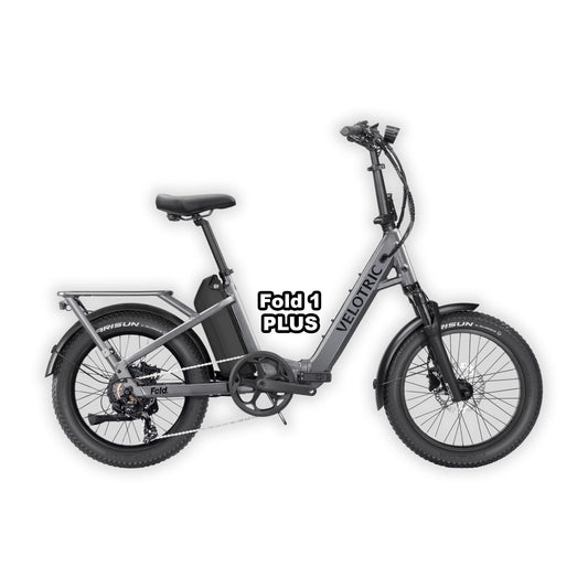 Velotric Fold 1 PLUS eBike in Stone Gray, folded and packed inside its box