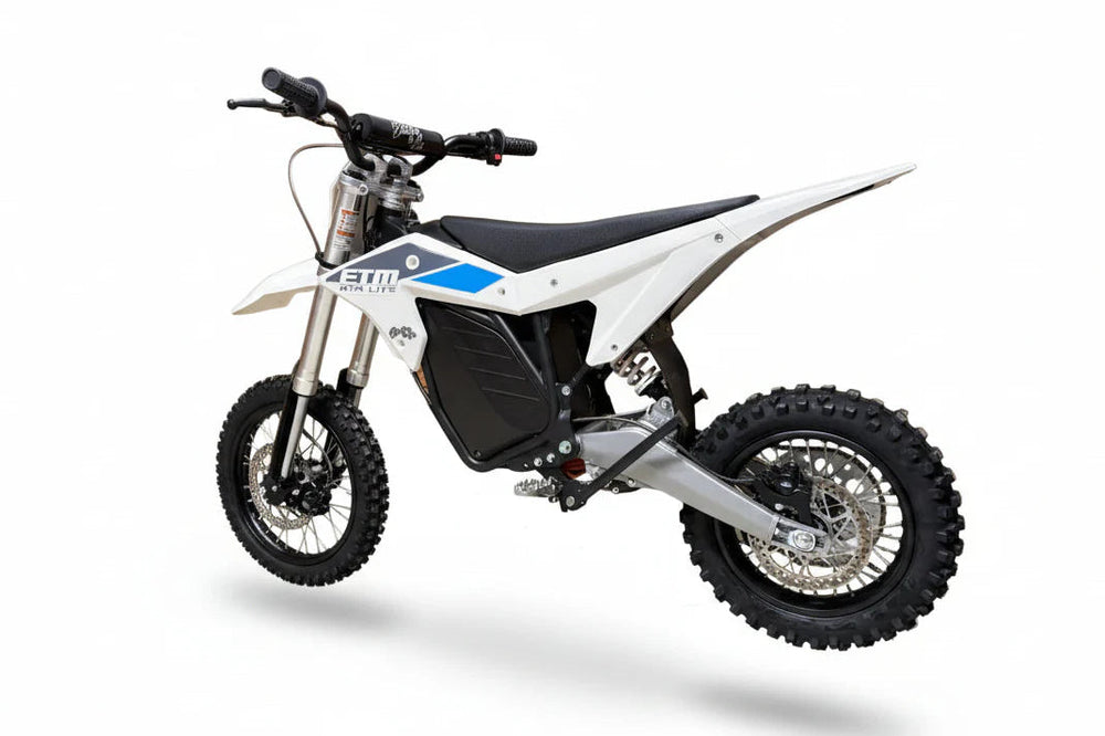 Electric bike Electro & Co ETM RTR Lite, black frame, upright handlebars, front suspension, displayed in a showroom setting.