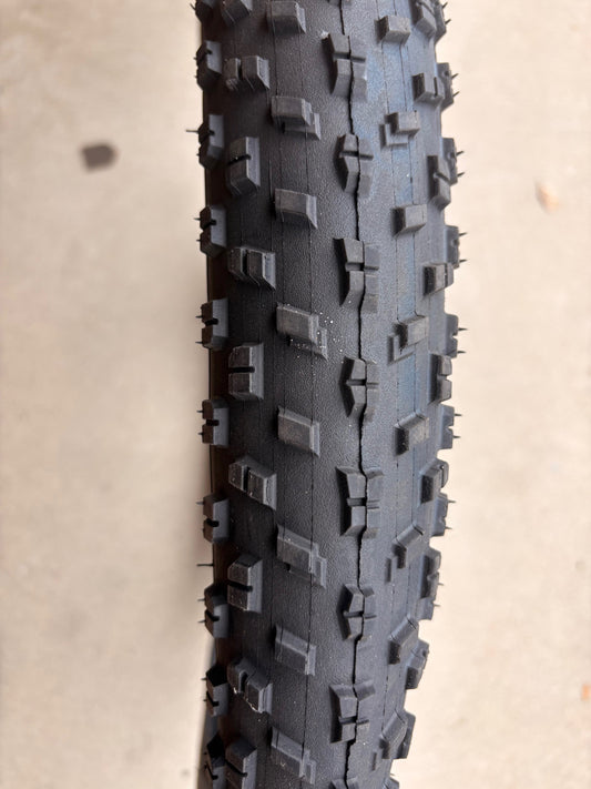 A black eBike with 26x4 inch Chao Yang fat tires, shown in a side profile against a plain background.