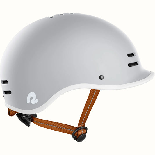Matte bone Retrospec Remi eBike helmet accessory, side view, against a white background