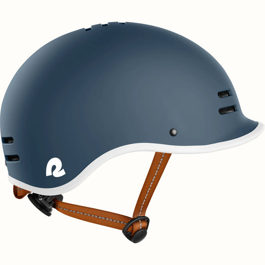 Matte navy Retrospec Remi eBike helmet, side view, with adjustable straps and ventilation holes
