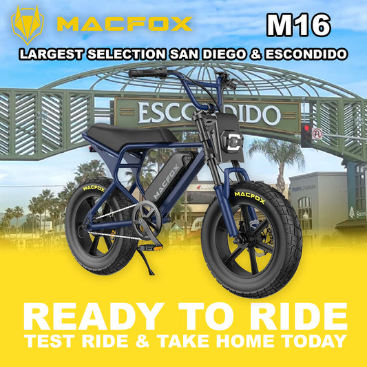 Macfox M16 eBike in R2R Navy Blue, side view, parked on pavement