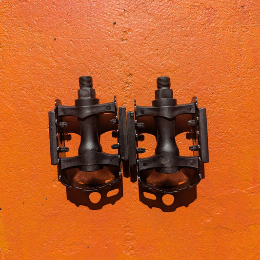 Metal eBike pedals, Style 5, featuring a sturdy design with textured surface and multiple grip pins, shown in a close-up product image.