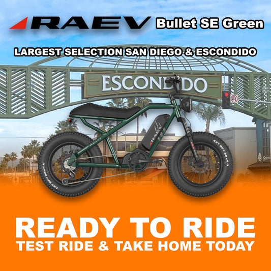 Metallic green Raev Bullet eBike parked outdoors, side view, with R2R Escondido branding visible.