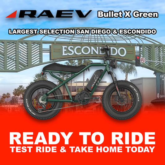 Metallic green Raev Bullet X eBike parked outdoors in Escondido, side view