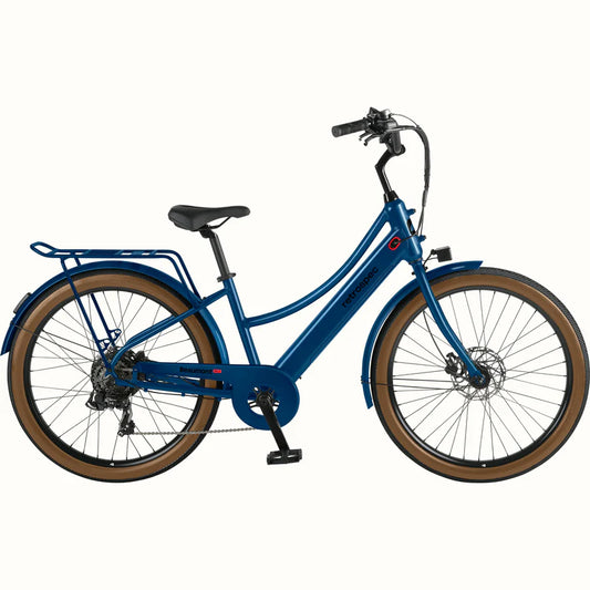 Retrospec Beaumont Rev 3 Plus eBike in Classic Blue, side view, showing step-through frame, rear rack, and black tires.