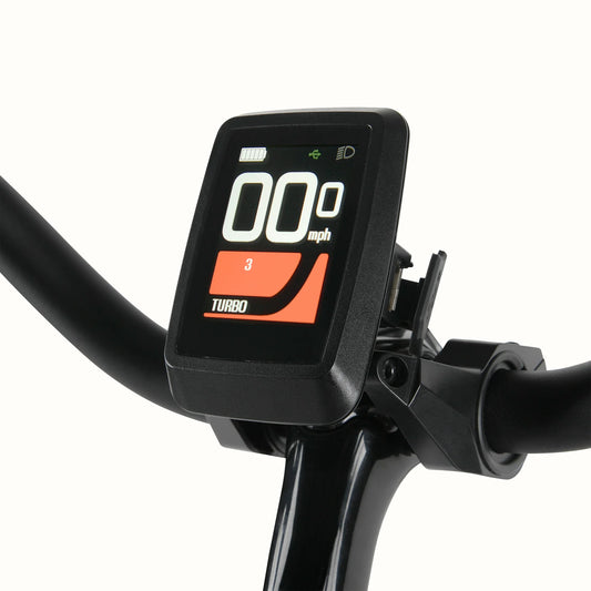 A black Retrospec Beaumont Rev 3 Plus electric bike with a step-through frame, rear rack, and front basket, shown from the side against a white background.