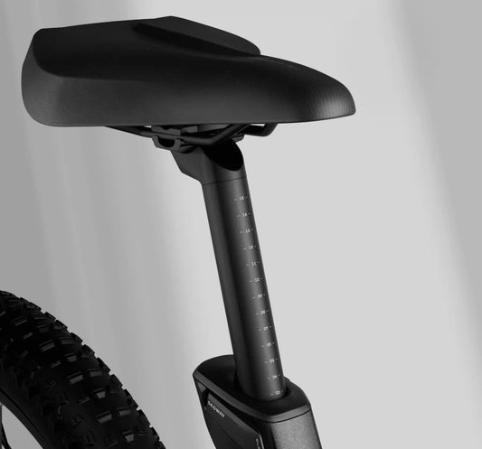 A Segway Xafari eBike parked outdoors, showcasing its sleek frame, wide tires, and integrated battery.