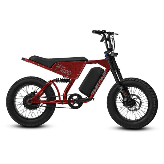 A Diablo Red eBike Strike Rhino AT7 electric bike, side view, showcasing its sturdy frame, thick tires, and modern design.