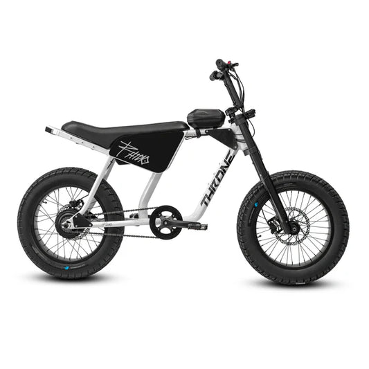 White eBike Strike Rhino model "Savage 1" side view, showcasing its sturdy frame, thick tires, and modern design against a plain background.
