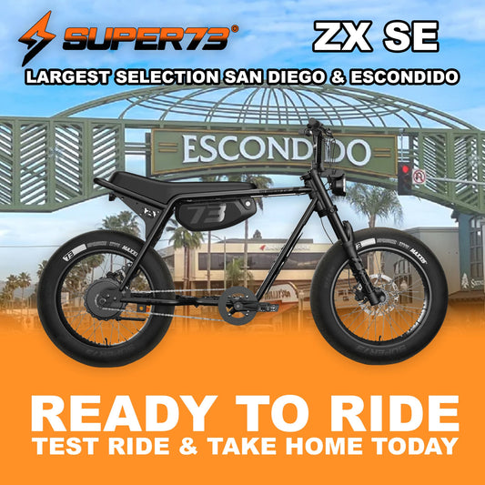 Super73 ZX SE electric bike in R2R Blackout color, side view, black frame with black wheels and seat, minimalist urban design.