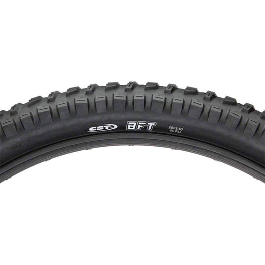 Side view of a 26x2.4 CST BFT eBike tire showing tread pattern and branding on the sidewall.