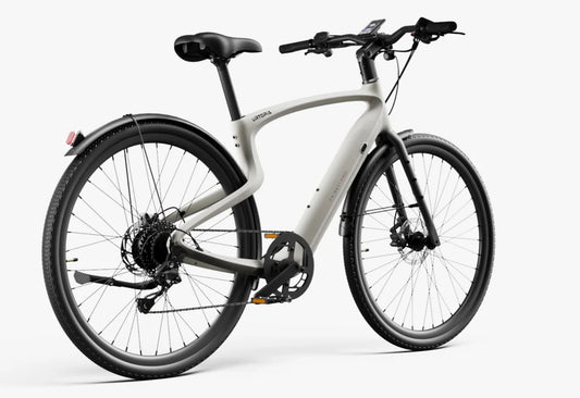 Urtopia Carbon Classic eBike in creme color, side view, showcasing lightweight carbon frame and modern design.