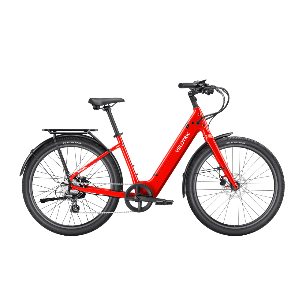Red Velotric Breeze 1 eBike in classic scarlet color, side view, isolated on white background