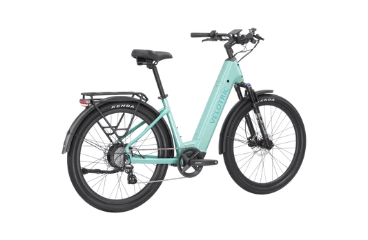 Mint green Velotric Discover 2 eBike in original box, product image showing bike packaging and branding.