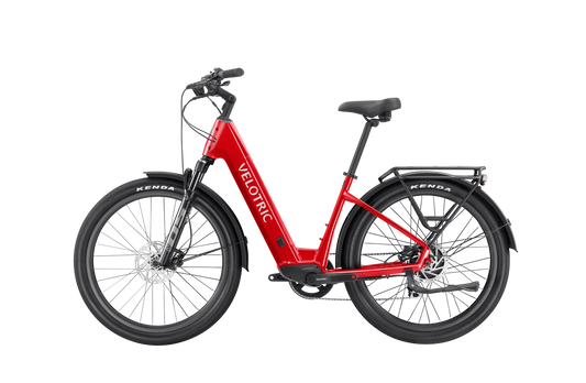 Velotric Discover 2 electric bike in Cherry Crimson color, side view, showcasing step-through frame, battery, and rear rack.