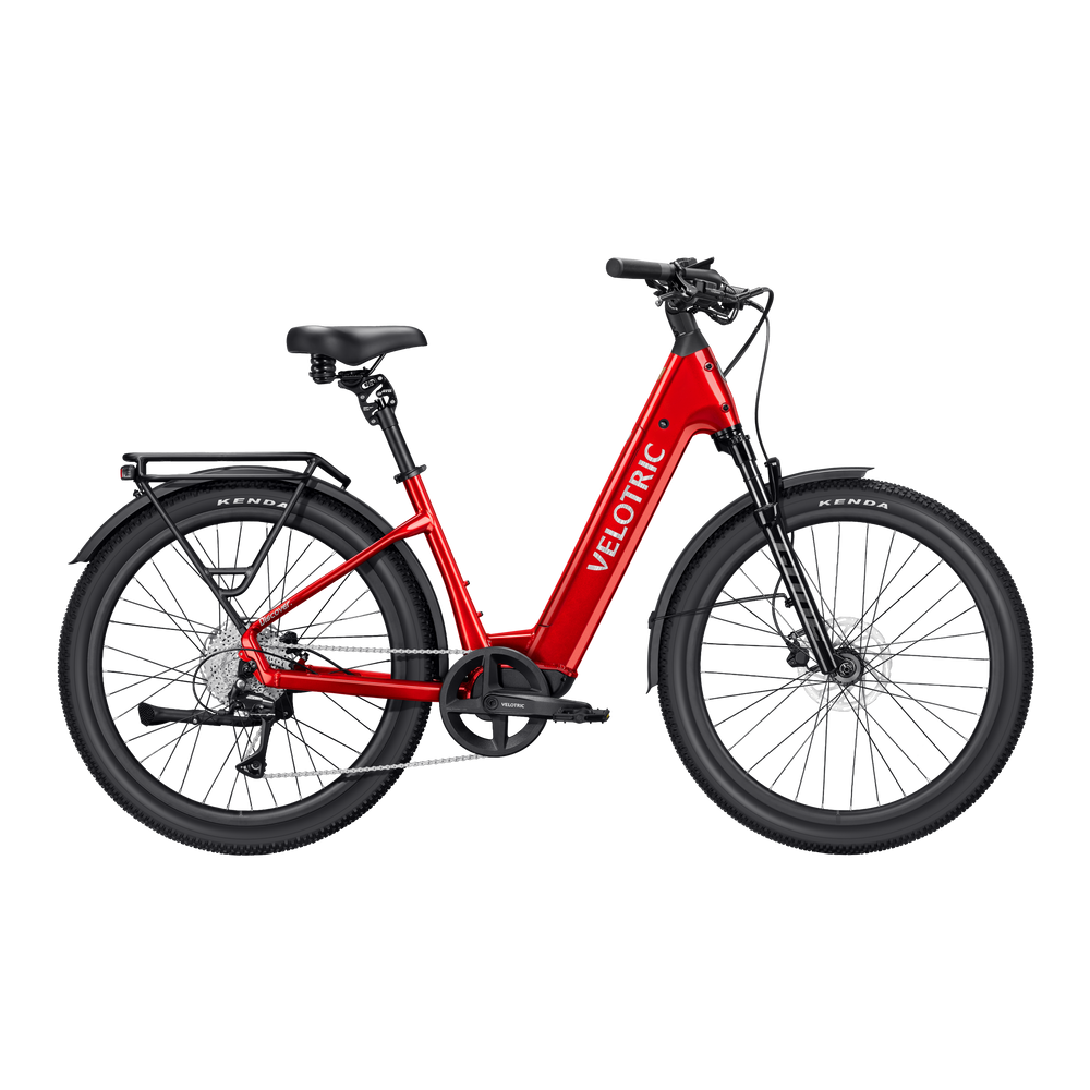 A cherry crimson Velotric Discover 3 eBike shown from the side, highlighting its sleek frame, integrated battery, and upright handlebars.