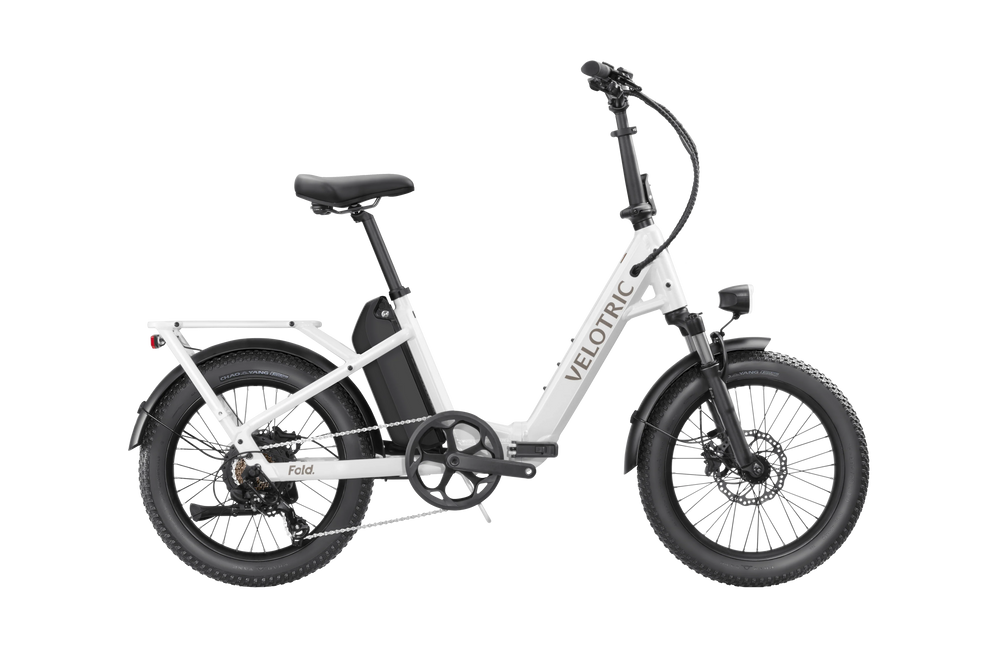 Pearl White Velotric Fold 1 eBike, folded, side view, against a plain background