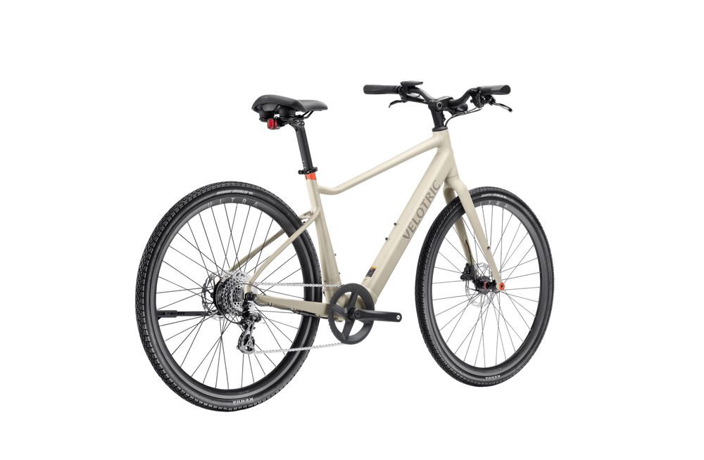 Velotric T1 ST Plus electric bike in sand color, side view, isolated on white background