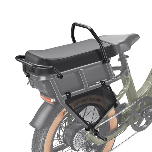 A Velotric Go e-bike equipped with the Mad Passenger Kit, featuring a rear passenger seat, foot pegs, and a sturdy rear rack, shown in a studio setting.
