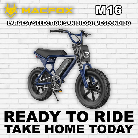 Navy blue Macfox M16 electric bike side view on white background