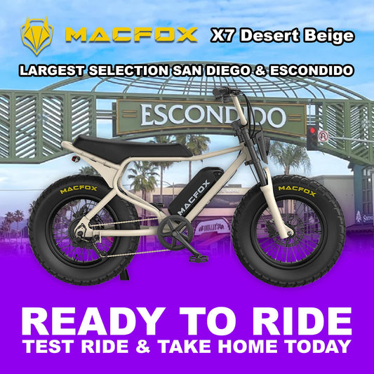 Macfox X7 eBike in desert beige color, single battery trim, displayed outdoors in Escondido desert setting.