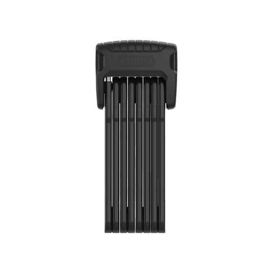 A close-up image of the Abus Bordo Granit 6500K eBike lock, displayed in-store, showing its sturdy black folding design and secure locking mechanism.