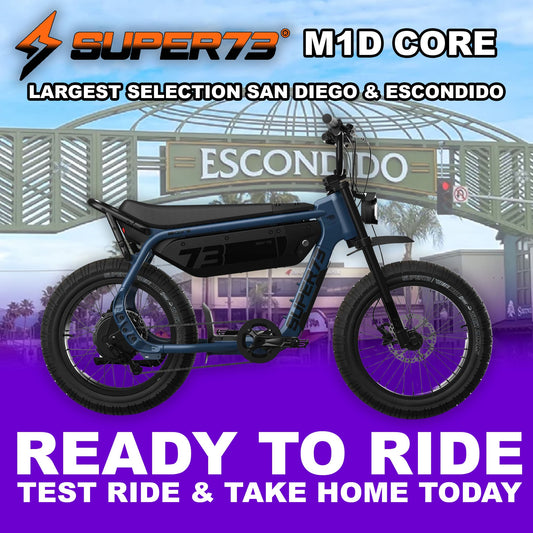 Super73 M1D Core eMOTO eBike in Slate color, side view, ready to ride, displayed against a plain background