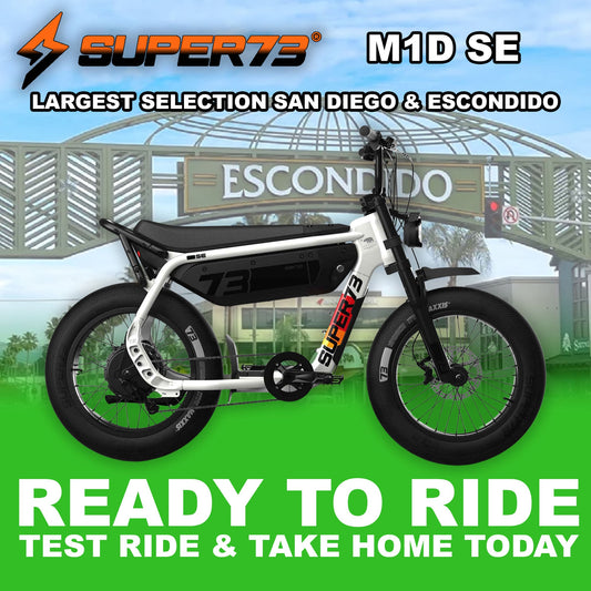 Super73 M1D SE eMOTO eBike in Baja color, side view, ready to ride, displayed on a plain background