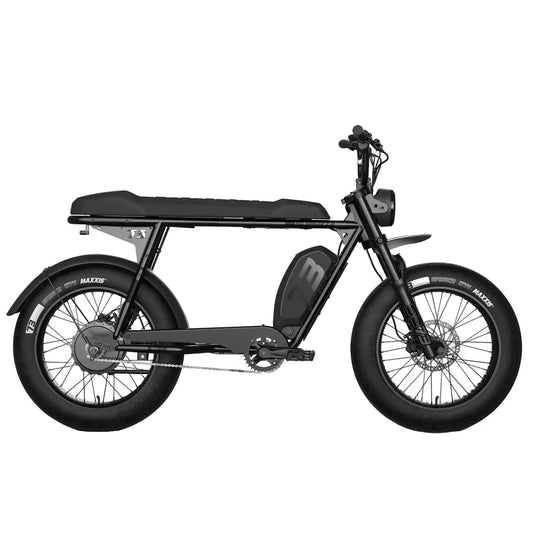 Side view of the Emoto eBike Super73 S2 SE in black, displayed in a showroom setting, highlighting its frame, tires, and battery.