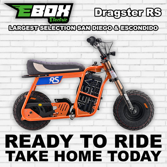 eMOTO Ebox Dragster RS electric bike in R2R Orange, side view, against a white background