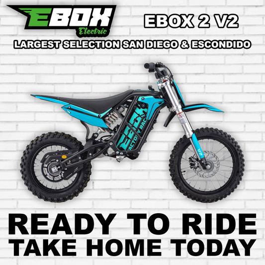 eMOTO Ebox 2 V2 electric bike in teal color, side view, displayed against a white background