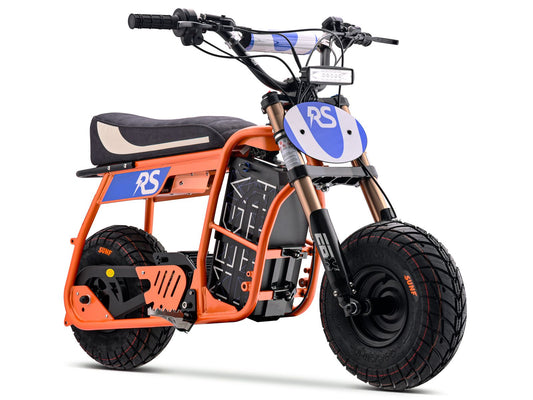 eMOTO Stomp Ebox Dragster RS electric bike in orange, shown in its box