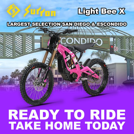 Pink eMOTO Surron Light Bee X electric bike, side view, ready to ride, product image