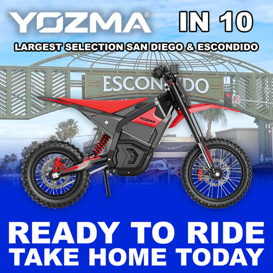 Red eMOTO Yozma IN 10 electric scooter, ready to ride, side view against a plain background