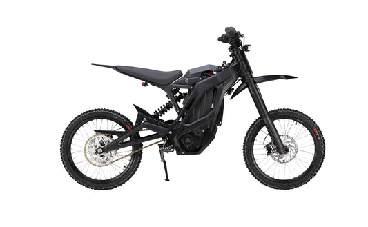 Side view of the eMOTO eRide Pro SS 2.0 electric dirt bike, featuring a rugged frame, 19x3 off-road tires, and a sleek black and red design.
