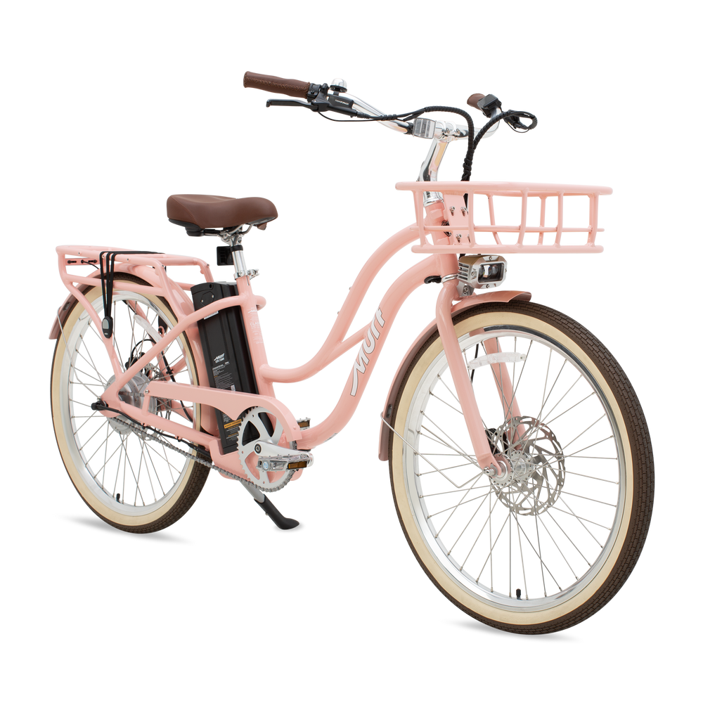A peach-colored Murf Gigi eBike parked on a sandy beach with the ocean in the background.