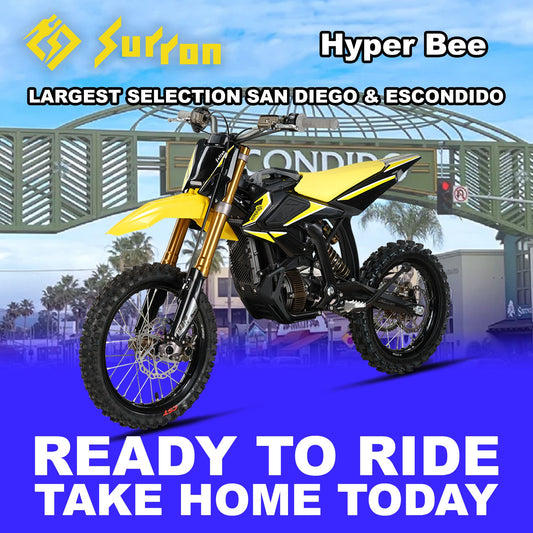 Yellow eMOTO Surron Hyper Bee electric motorcycle, ready to ride, side view, product image