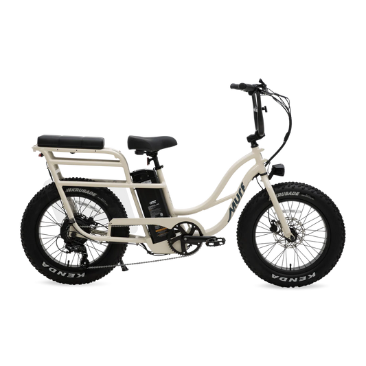 Side view of the Murf Higgs Plus eBike in Bone color, showcasing its sturdy frame, wide tires, and rear cargo rack.