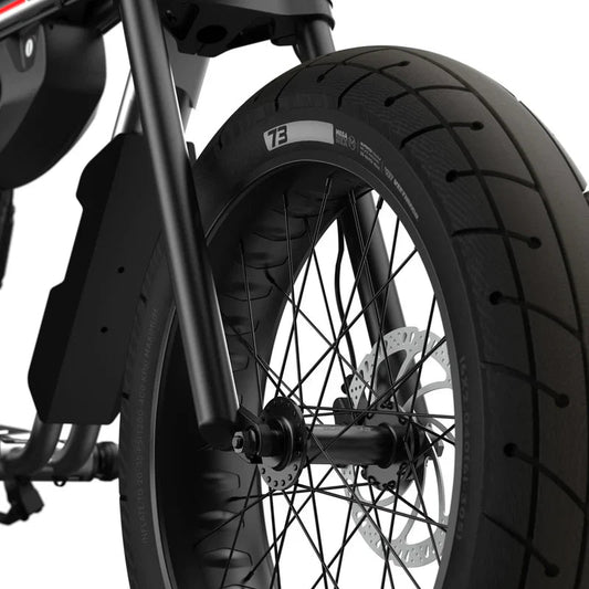 Side view of the Super73 ZX Core Legacy Series eBike in Metallic Aluminum, showcasing its sleek frame, thick tires, and minimalist design against a plain background.