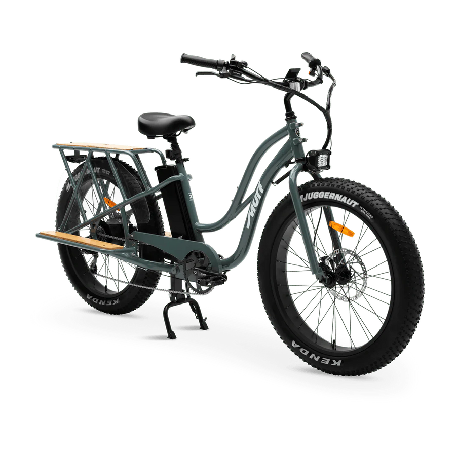 Murf Alpha Cargo fat tire electric beach cruiser e-bike, 52V 750W, designed for carrying cargo, shown in a shop setting.