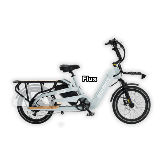 Grey eBike Revi Flux in its box, product image showing the packaged bicycle.