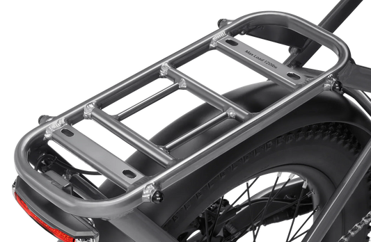 A side view of the Velotric Fold 1 Plus eBike in a folded position, showcasing its compact design, sturdy frame, and integrated battery.