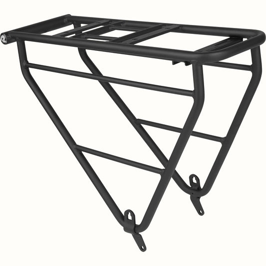 Black Retrospec Haul rear bike rack mounted on a bicycle, shown from a side angle against a white background.